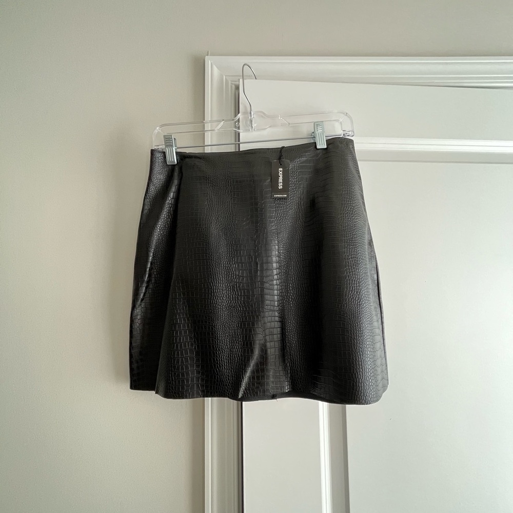 Black Express leather skirt size 4. Good condition. Smoke free pet free home.